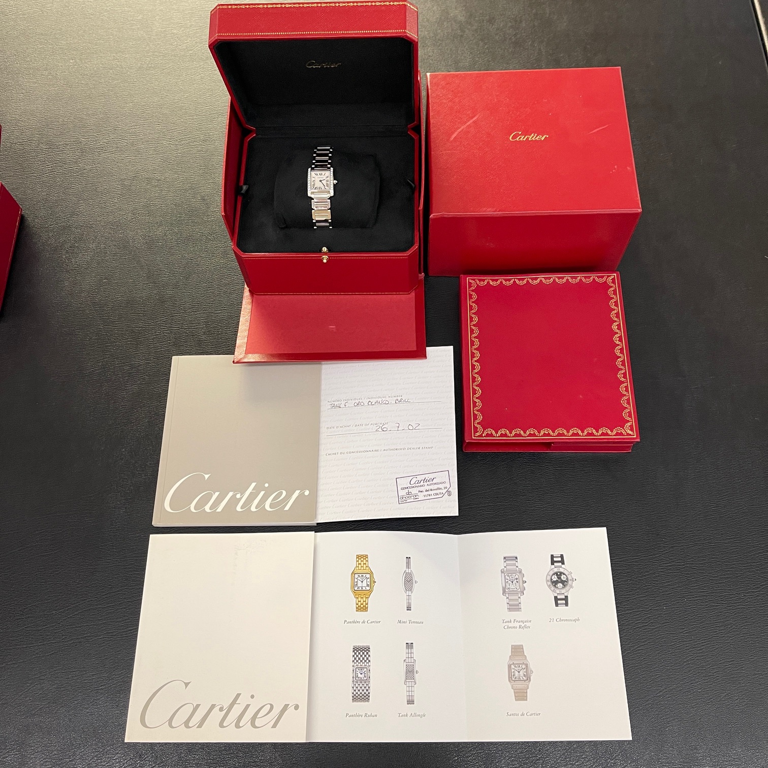 Cartier Herstellerbox mit Cartierpapieren und Garantiekarte einer gebrauchten Luxusuhr