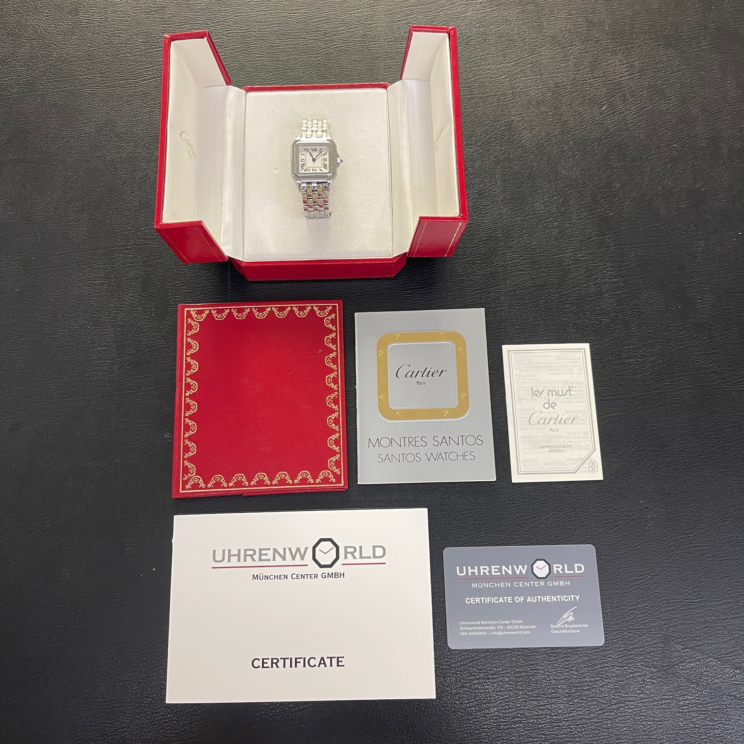 Gebrauchte Luxusuhr – Cartier Box und Uhrenworld-Echtheitszertifikat
