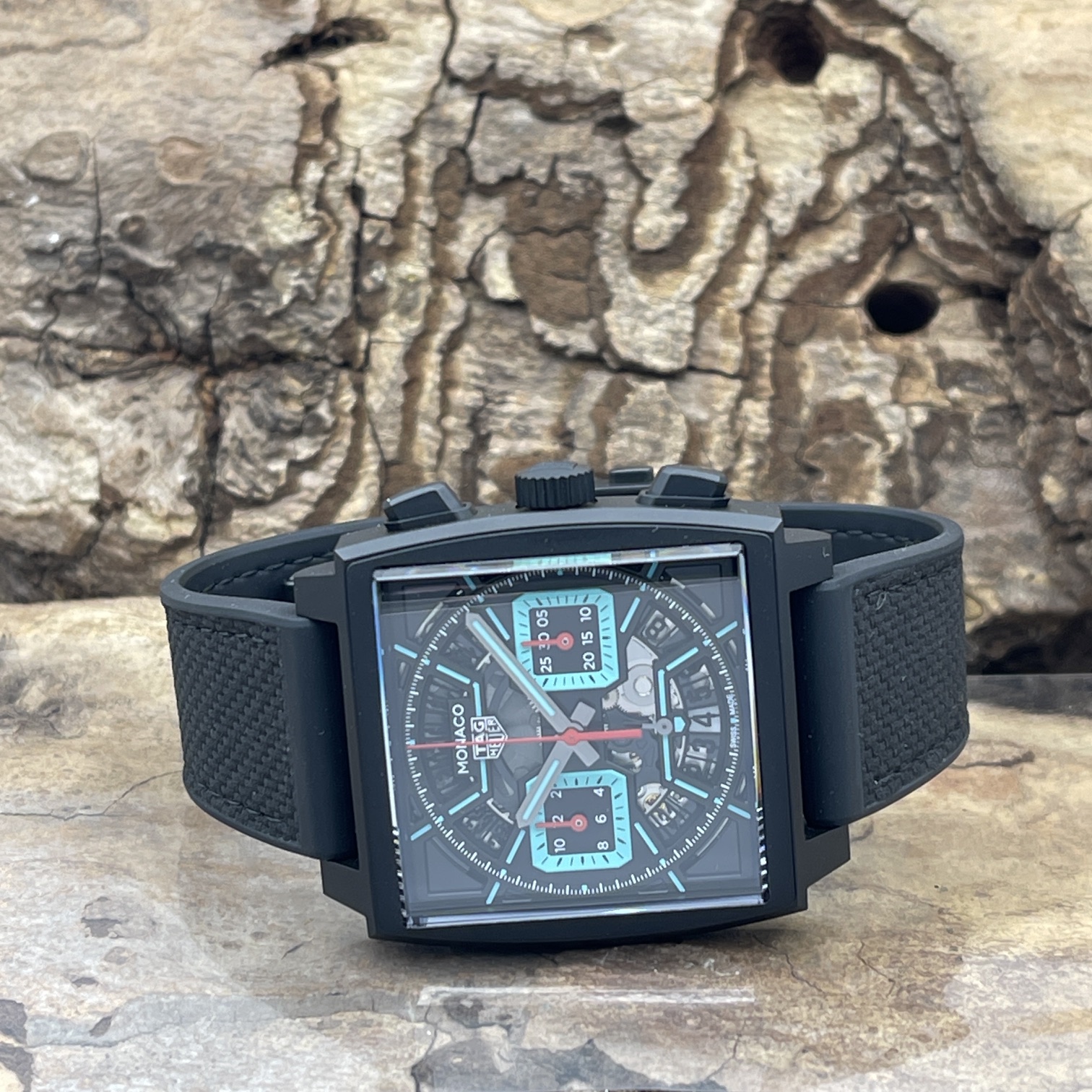 TAG Heuer - Monaco Chronograph Titanium DLC - Brand New - Full Set (2026) - Ref. CBL2184.FT6236 - Skeletonized black dial - Side view of the watch