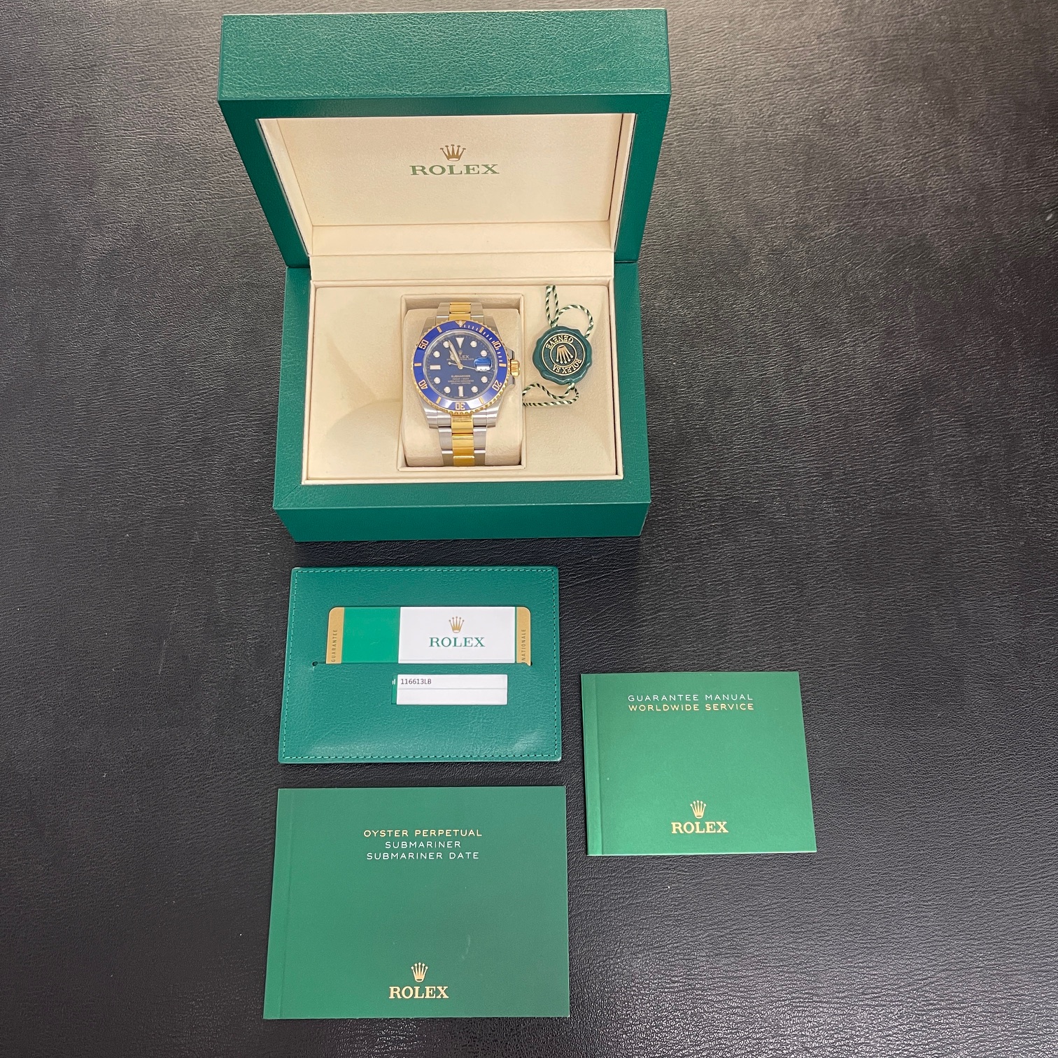Rolex - Submariner Gelbgold/Stahl - Blaues Blatt - Box/Papiere 2018 - Ref. 116613LB