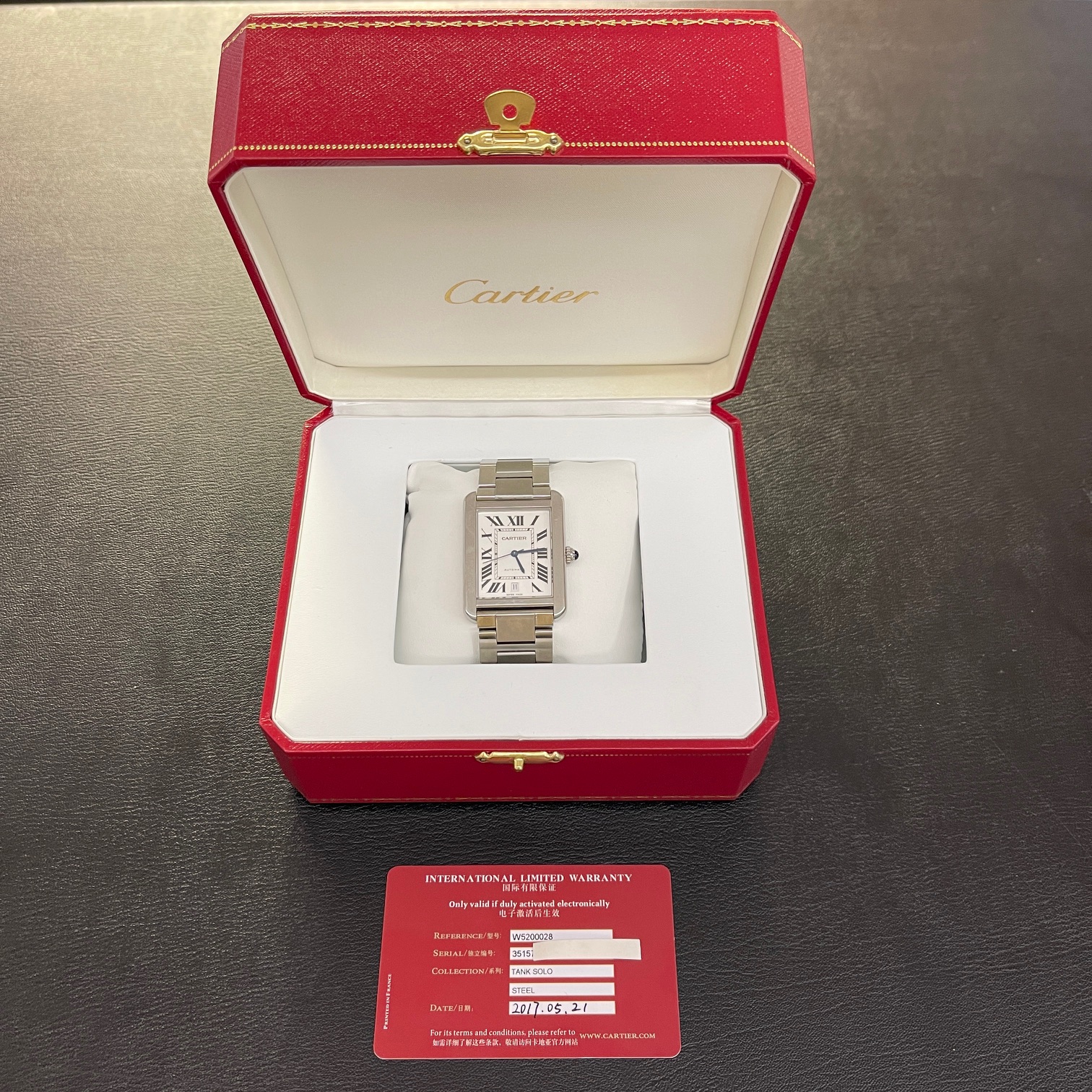 Cartier Herstellerbox mit Cartierpapieren und Garantiekarte einer gebrauchten Luxusuhr